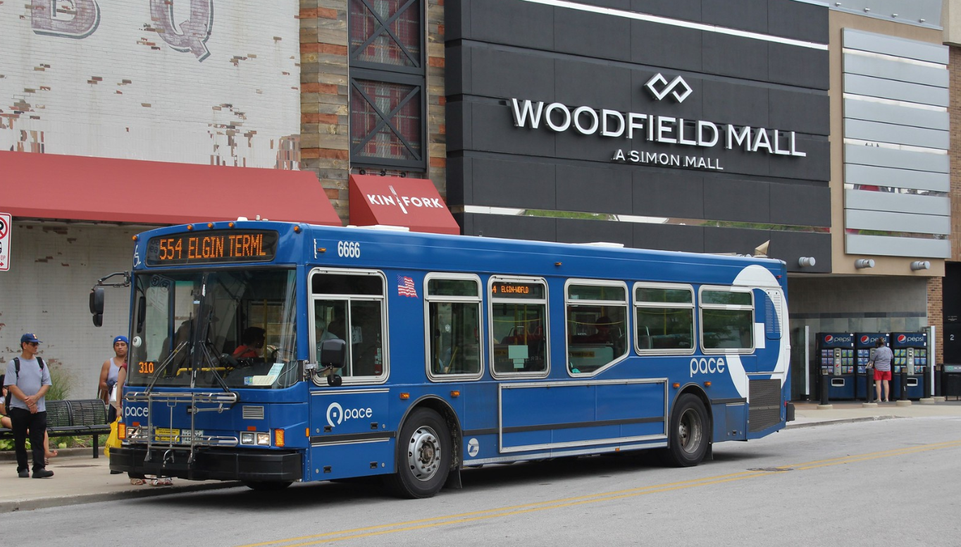 riders boarding a Pace bus at Woodfield Mall