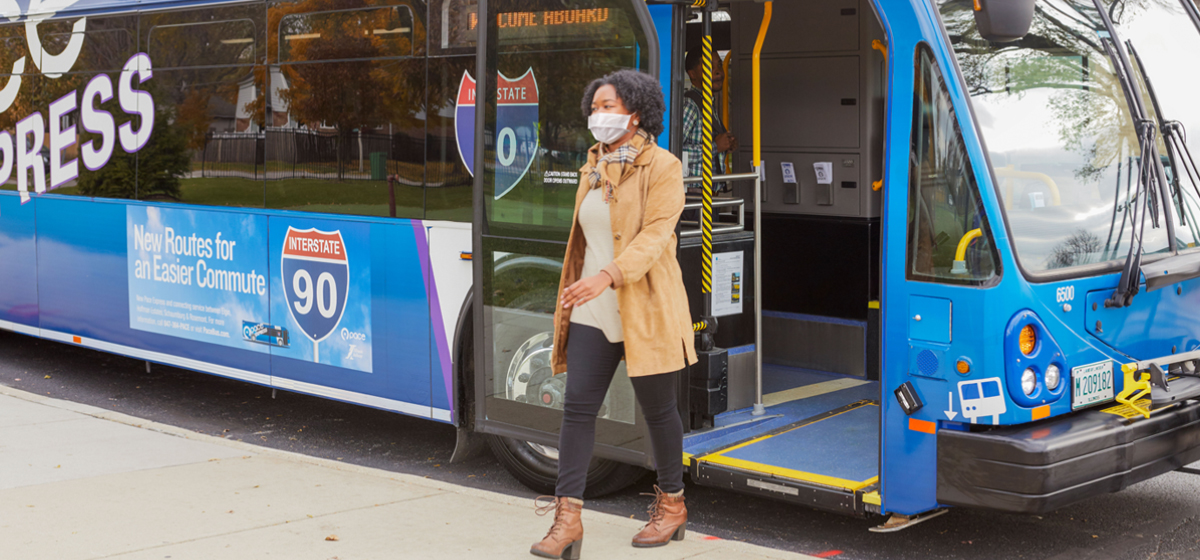 Image of female getting off the Pace bus