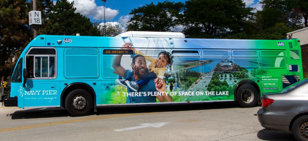 Image of a full size advertisement on a Pace bus