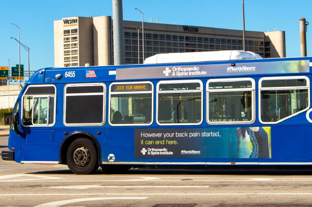 Image of a queen size advertisement on a Pace bus