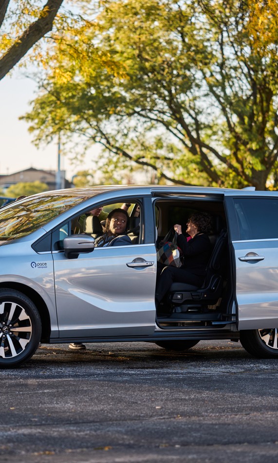 Vanpoolers Drive Together in a Pace Van.