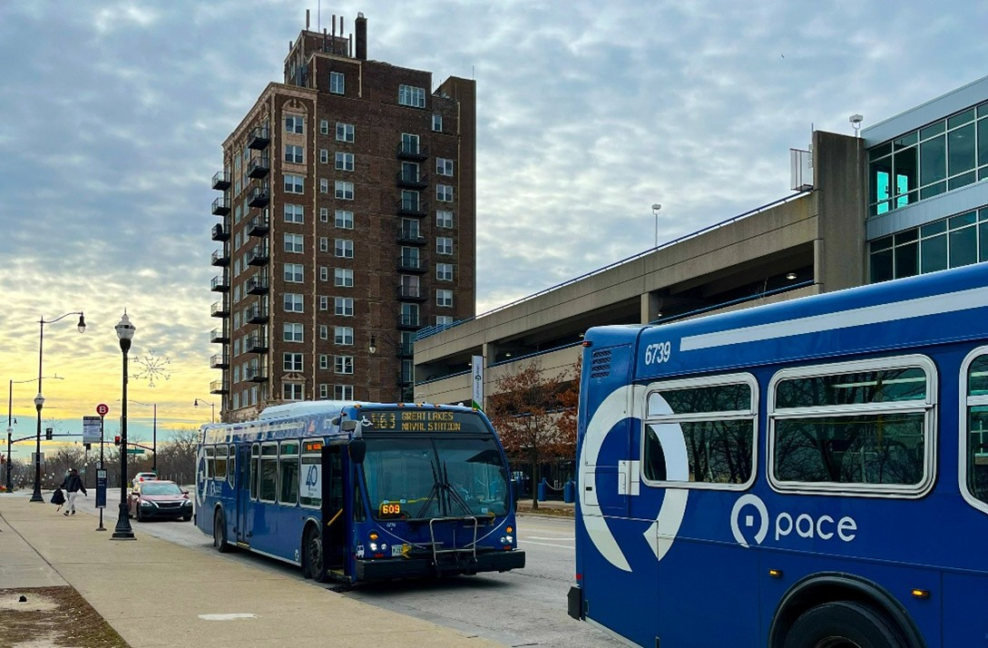 Image of two Pace buses in downtown waukegan