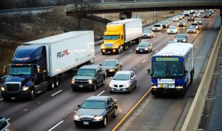 bus bypassing traffic on the shoulder