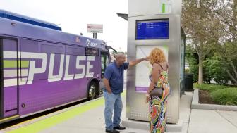 Image showing two riders are looking at a Pulse Station map 